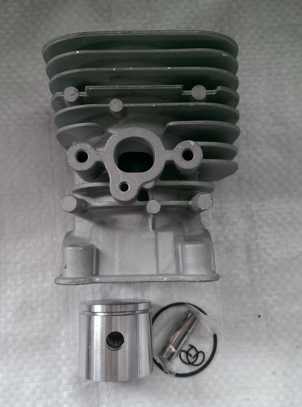 Поршневая триммер